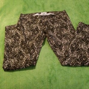 Black rose print skinny jeans